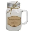 Bougie dans mug en verre avec couvercle senteur magnolia patchouli
