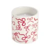 Bougie dans pot céramique blanc motif noeud rouge Ø8xH9cm (2 modèles)