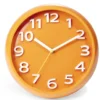 Horloge ronde plastique orange Ø25cm